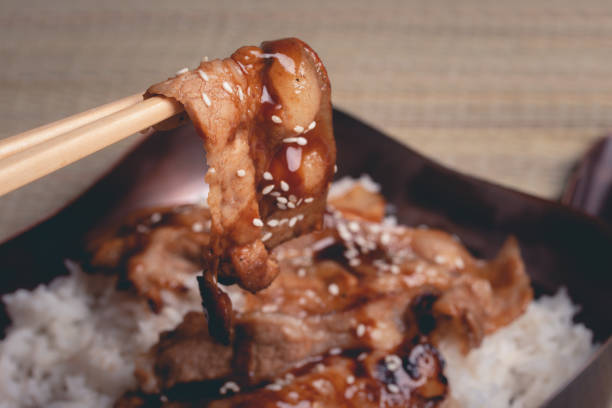 istock Chopsticks, sliced pork, Japanese sauce 1449821422