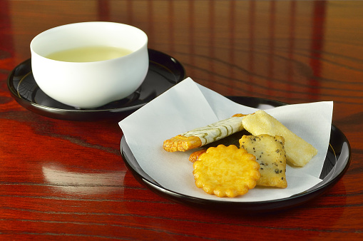 Senbei & A Cup of Green Tea on the Table/Studio Shot