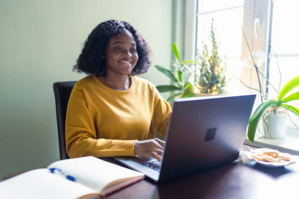 istock Woman working at home. Its a Christmas 1449822840