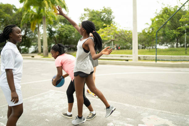 istock Female high school basketball team playing a game 1449827916