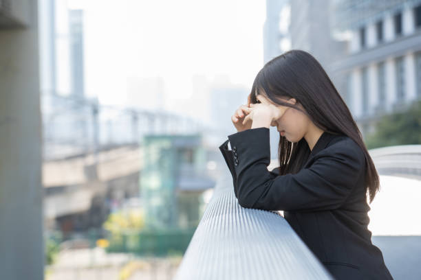 istock Japanese woman worried about work 1449828302
