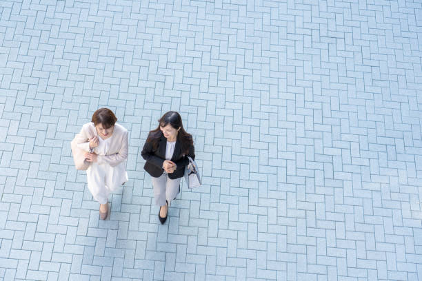 istock Two businesswomen from a bird's eye view 1449828576