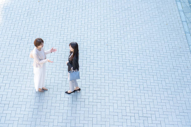 istock Two businesswomen from a bird's eye view 1449829242
