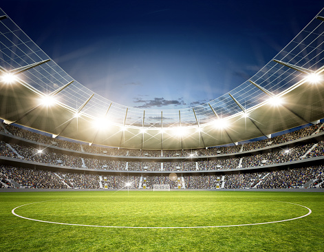 3D rendering of a virtual soccer stadium with floodlights in the evening