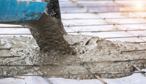 istock Concrete Truck Chute Pouring Wet Cement 1449831329