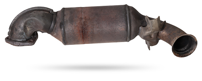 Automotive catalyst removed from a vehicle for repair with a ceramic coating inside as part of an exhaust system to remove harmful emissions in a car repair shop