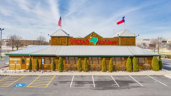 Joliet, IL, USA - April 8, 2019: Texas Roadhouse is a national steakhouse chain with over 460 stores in 49 our of 50 states, as well as some restaurants in other countries.