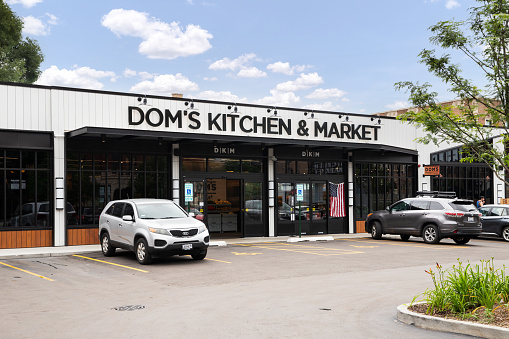 Chicago, IL, USA - July 13, 2021: Dom's Kitchen and Market is a local grocery store offering high quality food in the Lincoln Park neighborhood.