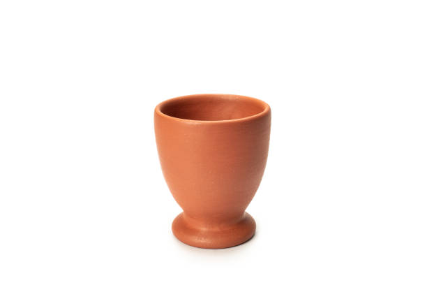 istock Close-up shot of single Earthen Glass isolated on white background 1449841191