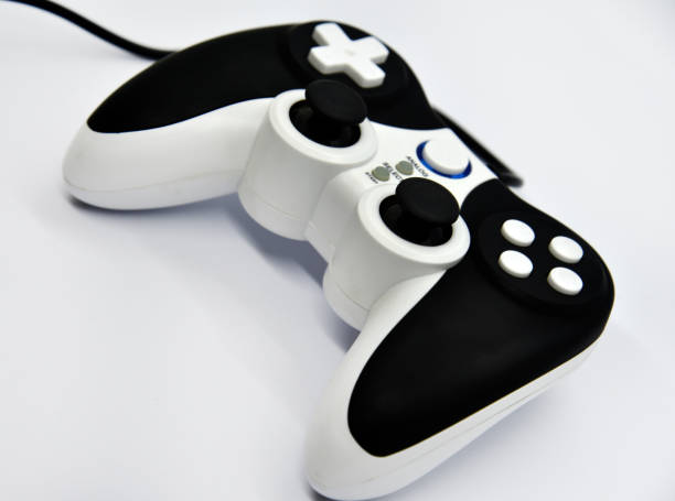 istock The gamepad is black and white on a white background. Game joystick close-up. A gamepad for a game console. 1449843273
