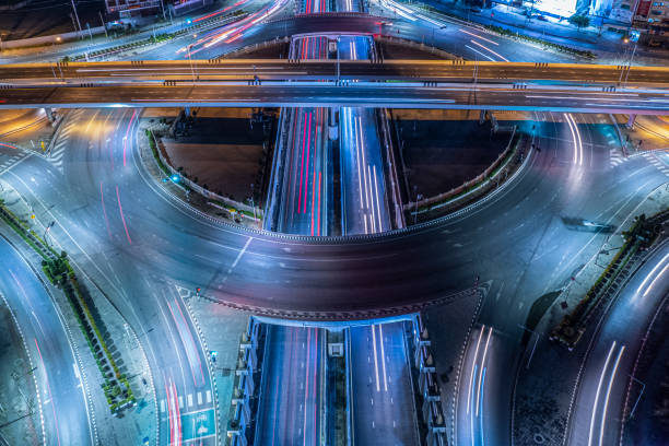 istock Expressway top view, Road traffic an important infrastructure, Drone aerial view fly in circle, traffic transportation, Public transport or commuter city life concept of economic and energ, transport. 1449843489