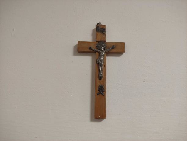 istock Crucifixion with Jesus on the wall 1449845283
