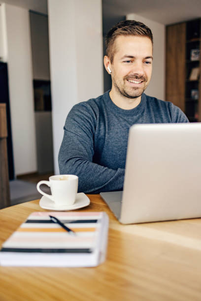 istock An entrepreneur has conference call with business partners on the laptop while working from home. 1449845307