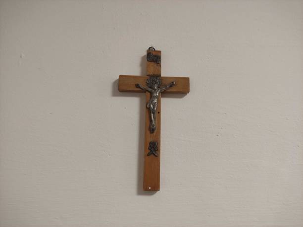 istock Crucifixion with Jesus on the wall 1449845318
