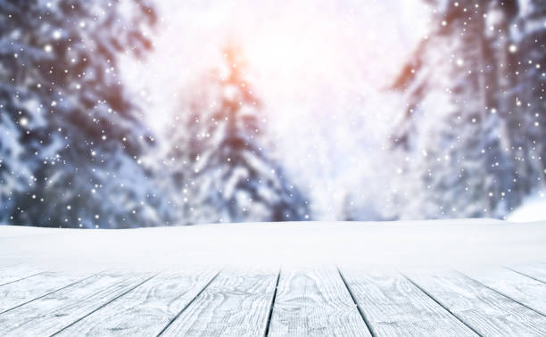 istock Winter Christmas scenic background with wooden table and copy space. 1449851596