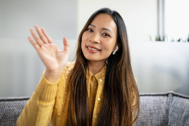 istock Female Influencer Vlogging Online With Smartphone From Home 1449854900