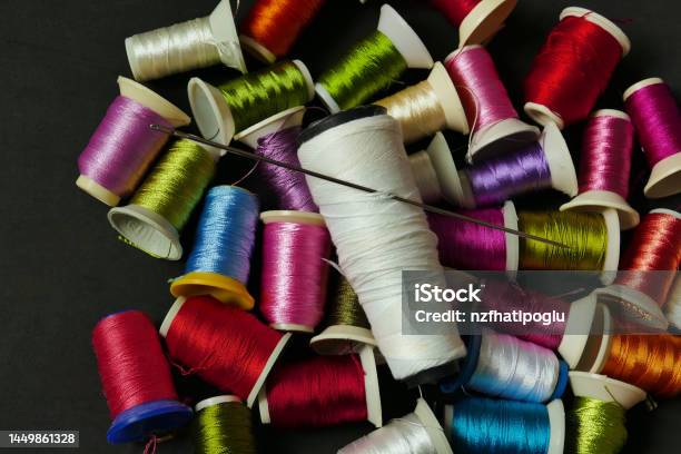 Closeup There Are Lots Of Colorful Spools Of Thread Thick Sewing Thread Big  Needle Stock Photo - Download Image Now - iStock