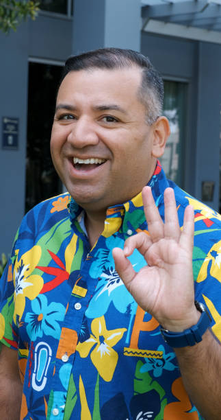 istock Smiling hispanic mature man looking at the camera smiling 1449861606