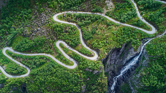 Aerial drone view of the windy road Lysevegen down to the Lysefjorden in Norway on a beautiful summer day