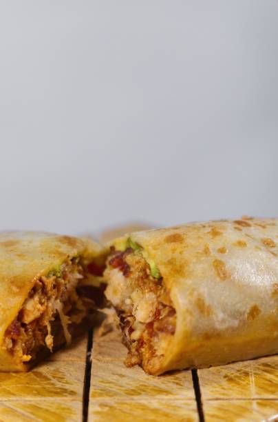 istock Pastor mexican burrito with meat and hot sauce 1449865982