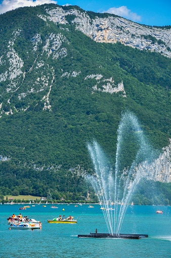 Annecy, France – July 17, 2012: A vertical shot of boats in Lake Annecy, France