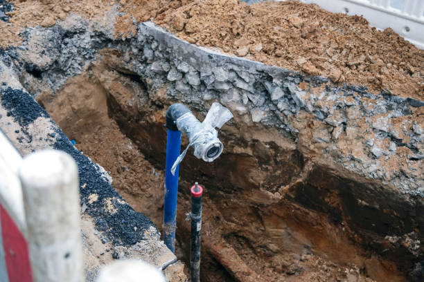 istock View into an open excavation pit with new water and other supply connections 1449873383