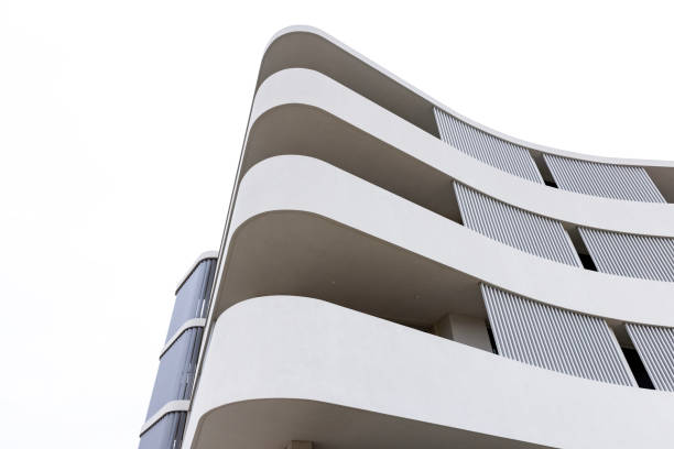 istock New, modern apartment building, white background with copy space 1449878304