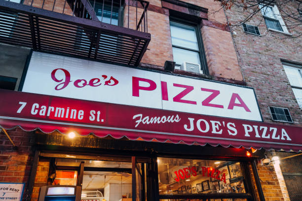Exterior of Joe's Pizza restaurant in Greenwich Village, Manhattan, New York, USA. stock photo