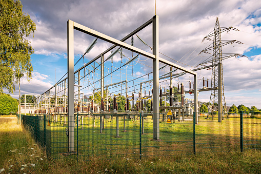 electrical substation with various voltage converters and transformers for energy transmission to consumers