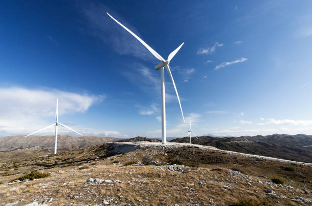 istock Wind turbine in remote mountains 1449882875