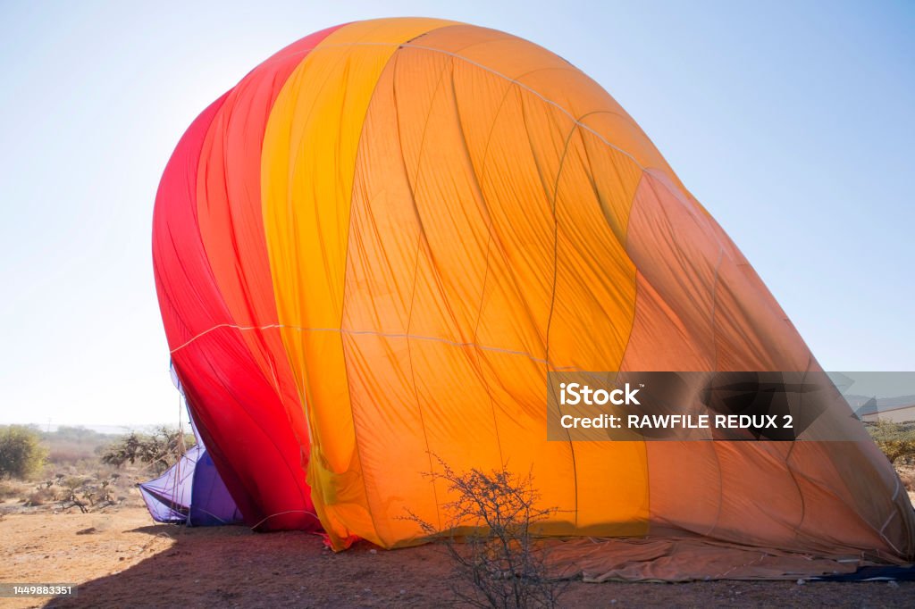 Hot air balloon A hot air balloon deflating after it has landed. Deflated Stock Photo