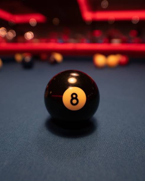 istock Vertical closeup of the 8 ball on a pool table 1449885938