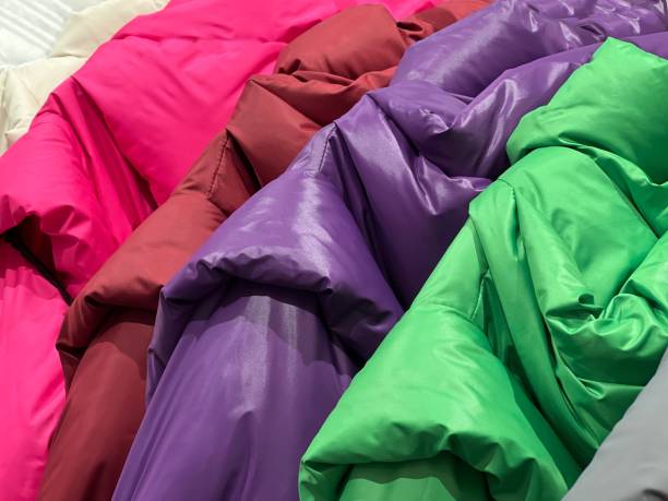istock Down jackets warm colorful clothes outerwear. 1449885997
