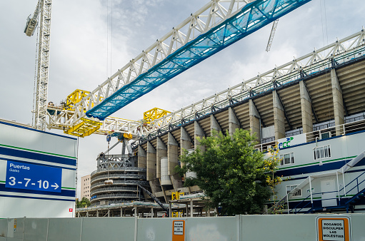 Madrid, Spain - September 13, 2021: Cranes in the renovation works of the Santiago Bernabéu Stadium, home of Real Madrid
