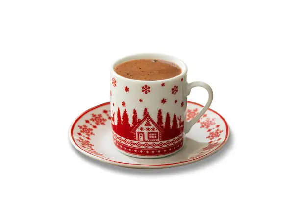 Turkish coffee in a christmas themed cup on white background