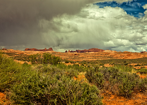 Desert landscape against a stormy sky