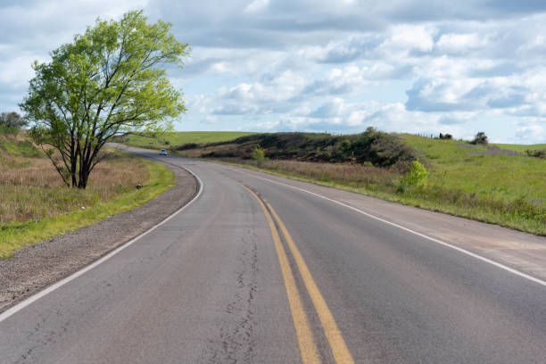 istock Highway cutting through rural landscape 1449893144