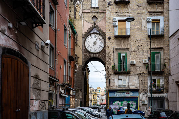 Street view of Naples. Clock tower and residence. stock photo