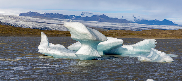 Fjallsarlon is a glacier lagoon, from the glacier system of Vatnajökull Located in South Iceland. The Fjallsarlon glacial lagoon is the little brother of the famous Jokulsarlon in Vatnajökull National Park.