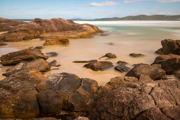 istock Rocks and waves in long exposure 1449903644