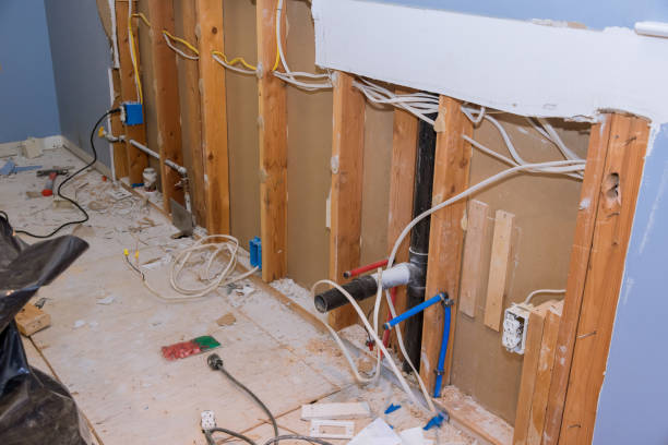 istock Repairs for remodeling in the kitchen that is under renovation, reconstruction with works progress demolition an old kitchen 1449912039
