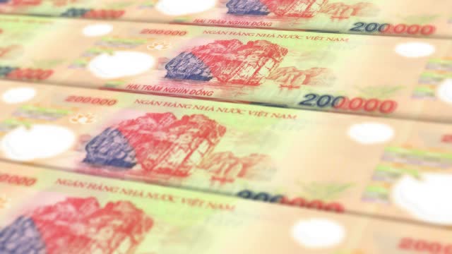Vietnamese Dong currency printing press seamless loop stock video