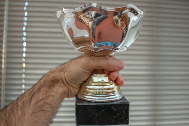 istock do not give up and you will win the trophy 1449913665