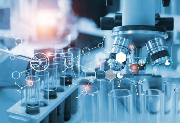 istock Double exposure microscope and Young woman scientific using equipment in the laboratory for research 1449926407