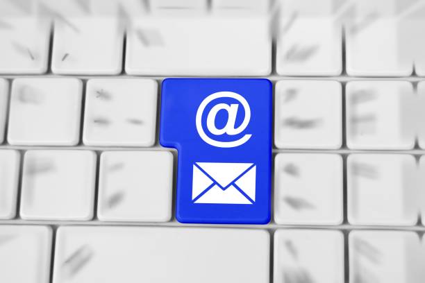 close-up of computer keyboard with enter key and email newsletter contact symbol on it