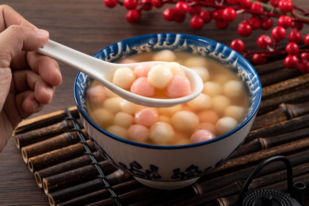 Red and white tangyuan with syrup soup.