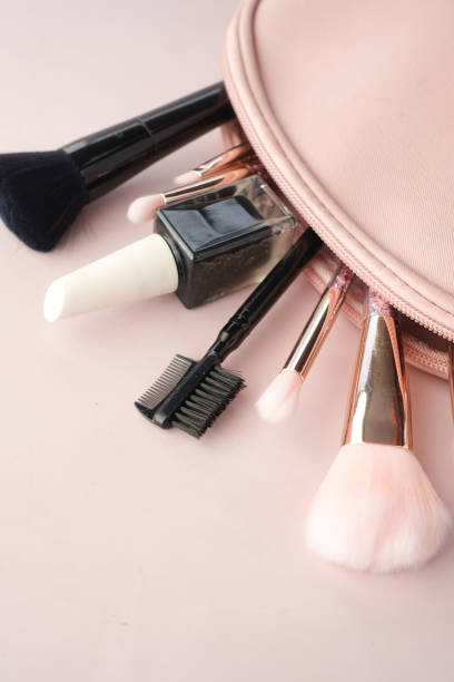istock top view of decorative black color cosmetic on dark background 1449955621