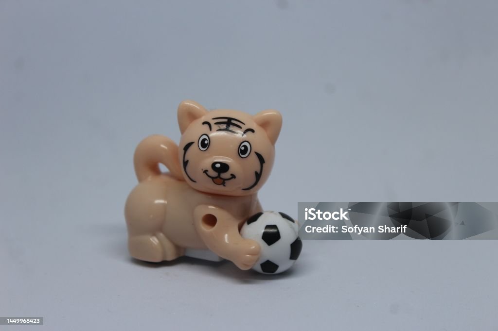 lion doll holding ball 2022 Stock Photo