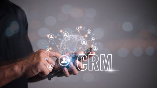 istock CRM Customer Relationship Management for business sales marketing system concept presented in futuristic graphic interface of service application to support CRM database analysis. 1449973736