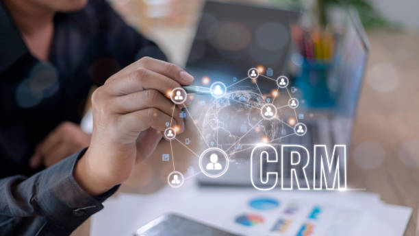 istock CRM Customer Relationship Management for business sales marketing system concept presented in futuristic graphic interface of service application to support CRM database analysis. 1449973741